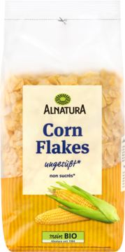 Alnatura Corn Flakes w przezroczystej torebce z etykietą, "ungesüßt", z grafiką kolb kukurydzy. Widok z przodu.