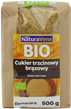 Opakowanie cukru trzcinowego brązowego Demerara NaturaVena BIO, widok z przodu na brązową torebkę z żółtą etykietą.
