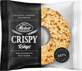 Opakowanie Melvit Crispy Rings, czarno-białe, z okrągłym, wieloziarnistym pieczywem chrupkim z ziarnami. Widok z przodu.