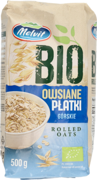 Melvit BIO Płatki Owsiane Górskie 500g, jasny worek z niebieskim paskiem i zielonym logo BIO, widok frontalny.