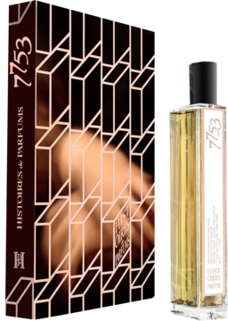 Perfumy Histoires & Parfums 7753 w szklanej butelce z jasnozłotym płynem i ciemna książka z geometrycznym wzorem, widok przód.