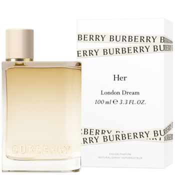 Burberry Her London Dream EDP. Przezroczysta butelka z bursztynowym płynem i złotą nakrętką, obok białe pudełko z nazwą.