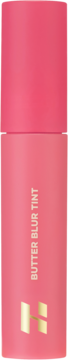 Holika Holika Butter Blur Tint, różowa tubka o matowym wykończeniu, z napisem i złotym logo H, widok z przodu.