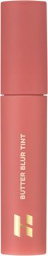 Holika Holika Butter Blur Tint 06 Luscious, pionowe koralowe opakowanie z napisem BUTTER BLUR TINT i złotym logo H.