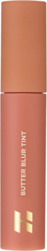 Holika Holika Butter Blur Tint nr 01 Salted, pionowa tubka w kolorze terakoty z matowym wykończeniem, złote logo H.
