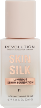 Buteleczka Revolution Skin Silk Luminous Serum Foundation F1, matowe szkło, beżowy odcień, widok z przodu.