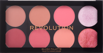 Paleta Revolution Sugar & Spice: czarna z 8 okrągłymi cieniami różów, beżu i brzoskwini, 6 matowych, 2 błyszczące.