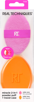 Real Techniques Miracle 2-in-1 powder puff w/ travel case. Pink puff above orange case, designed for powder & liquid.