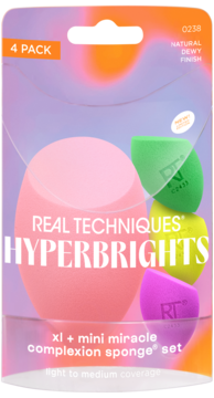 Zestaw Real Techniques Hyperbrights z 4 gąbkami do makijażu: XL różowa i 3 mini (zielona, żółta, fioletowa).