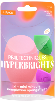 Zestaw Real Techniques Hyperbrights z 4 gąbkami do makijażu: XL różowa i 3 mini (zielona, żółta, fioletowa).