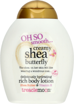 Biały balsam do ciała Treaclemoon Creamy Shea Butterfly z złotą nakrętką i etykietą z motylem, widok z przodu.