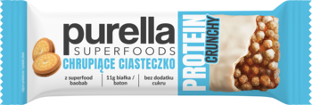 Baton Purella Superfoods Protein Crunchy, chrupiące ciastko, białe opakowanie z widocznymi kawałkami.