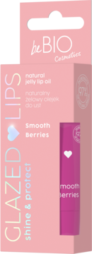 Różowe pudełko be BIO Cosmetics Natural Jelly Lip Oil Smooth Berries z widocznym różowym sztyftem z białym sercem.