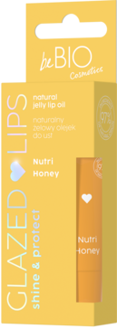 Żółte pudełko olejku do ust be BIO Nutri Honey Glazed Lips, z widoczną tubką obok, widok z przodu.