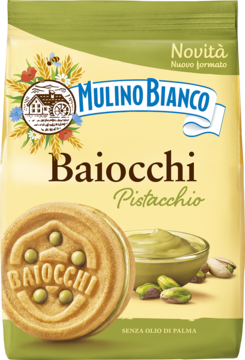 Mulino Bianco Baiocchi Pistacchio: beżowo-zielone opakowanie włoskich ciastek z pistacjowym kremem, zbliżenie na ciastko.