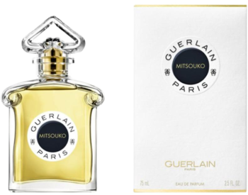 Guerlain Mitsouko woda perfumowana dla kobiet, butelka ze złotym płynem i białe pudełko, widok z przodu.