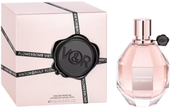 Flowerbomb perfumy Viktor & Rolf: różowa, fasetowana butelka i pudrowe pudełko z czarną pieczęcią V&R.