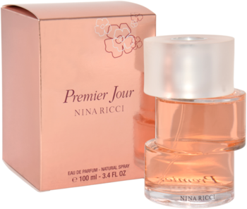 Nina Ricci Premier Jour woda perfumowana dla kobiet. Transparentna butelka z brzoskwiniowym płynem i pasujące pudełko z kwiatami.