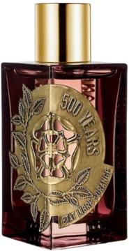 Perfumy unisex Etat Libre d’Orange 500 Years, w ciemnobordowym flakonie ze złotym emblematem i nakrętką.