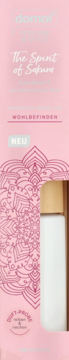 Różowe opakowanie domol Perfume & Style The Spirit of Sakura, częściowo widoczny biały flakon z drewnianą nakrętką.