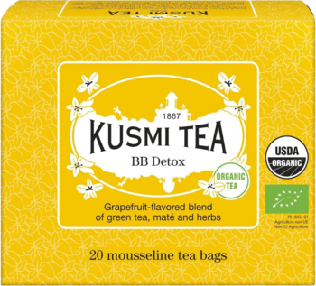 Kusmi Tea BB Detox, yellow box with a white floral label for grapefruit green tea blend, front view.