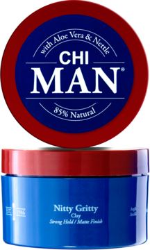 Chi Man Nitty Gritty Clay, open blue jar with red lid, strong hold matte finish hair product.