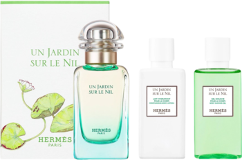 Zestaw prezentowy Hermes Un Jardin Sur Le Nil: flakon wody toaletowej, biały balsam i zielony żel pod prysznic.
