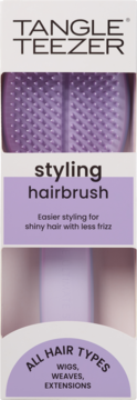 Front view of Tangle Teezer styling hairbrush in white and purple box, for all hair types, less frizz.