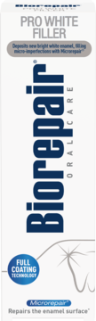 Białe opakowanie pasty Biorepair Pro White Filler, widok z przodu, z napisem "Repairs the enamel surface".