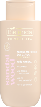 Beżowa butelka Bielenda Nutri Mleczko odżywcze do ciała Sandalwood z miodem manuka, widok z przodu.