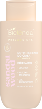 Beżowa butelka Bielenda Nutri Mleczko odżywcze do ciała Sandalwood z miodem manuka, widok z przodu.
