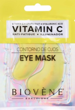 Biovène Vitamin C eye mask patches in clear sachet, yellow top, showing two green banana-shaped masks.