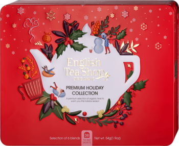 Czerwony, świąteczny zestaw herbat English Tea Shop w puszce z motywem czajnika i zimowymi zdobieniami, widok z góry.