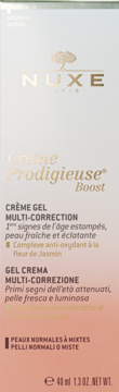 Opakowanie Nuxe Crème Prodigieuse Boost, żel-krem multi-korygujący, 40ml, biało-brzoskwiniowe z złotym logo.