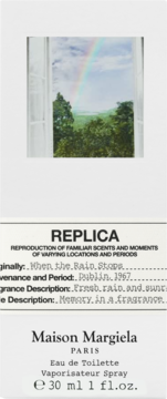 Maison Margiela Replica When the Rain Stops 30ml EDT, białe pudełko, widok z przodu, tęcza za oknem.