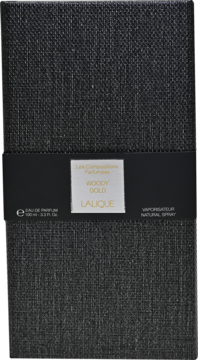 Woda perfumowana Lalique Woody Gold, czarne pudełko z teksturą lnu i złotą etykietą z nazwą produktu, widok z przodu.