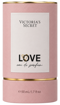 Victoria's Secret Love woda perfumowana w różowym cylindrycznym opakowaniu, ze złotym paskiem i napisem Love.
