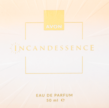Złoto-białe opakowanie Avon Incandessence Eau de Parfum 50ml, z promienistym logo i złotym napisem.