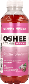 OSHEE Vitamin Water o smaku czerwonych winogron i dragonfruit, w przezroczystej butelce z różową etykietą, widok z przodu.