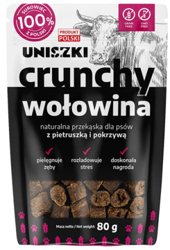 Czarne opakowanie Uniszki Crunchy Wołowina, naturalna przekąska dla psów z pietruszką i pokrzywą. Z przodu widać wołowe smakołyki.