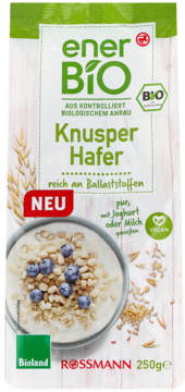 Green & white enerBiO Knusper Hafer pouch, 250g, with an image of oats, yogurt & blueberries. NEW, vegan.