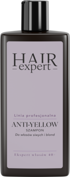 Hair Expert Anti-Yellow szampon do włosów blond/siwych w ciemnej butelce z fioletową etykietą, widok z przodu.