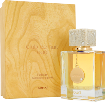 Armaf Club de Nuit Oud unisex perfumy. Złote pudełko z drewnianym wzorem i butelka z błyszczącym korkiem.