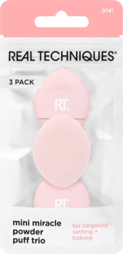 Real Techniques Mini Miracle Powder Puff Trio: 3 różowe puszki do pudru do settingu i bakingu, w przezroczystym opakowaniu.