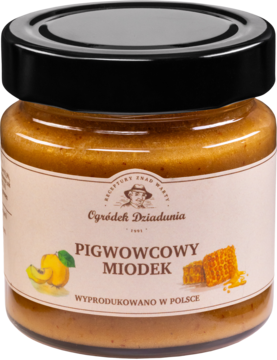 Złoty miód wielokwiatowy pigwowcowy Ogródek Dziadunia w szklanym słoiku. Czarna pokrywka, widok z przodu.