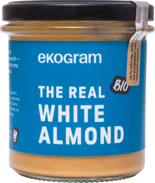 Słoik Ekogram The Real White Almond BIO pasta migdałowa, jasnobeżowa zawartość, niebieska etykieta, przód.
