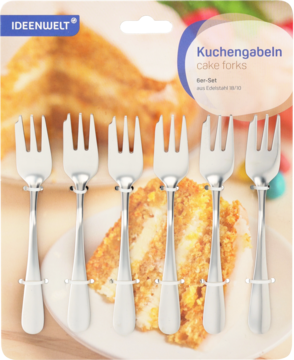 Zestaw 6 widelczyków do ciasta Ideenwelt, srebrne z białymi rączkami, w blistrze na tle tortu. Widoczne napisy.
