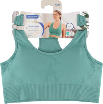 Gładki, turkusowy biustonosz sportowy bezszwowy z szerokimi ramiączkami, widok z przodu z opakowaniem.