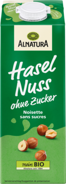 Alnatura Hazelnut drink, organic and sugar-free, in a green carton, front view with whole and cracked hazelnuts.