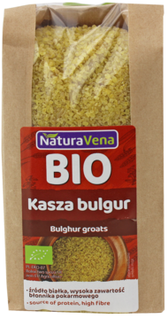 NaturaVena BIO kasza bulgur w brązowej papierowej torbie, widok z przodu. Widoczne zielonkawo-żółte ziarna, wysoki błonnik.